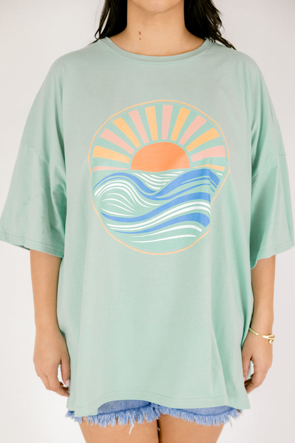 Chic Soul plus size clothing, light green oversized boyfriend tee with sunset graphic