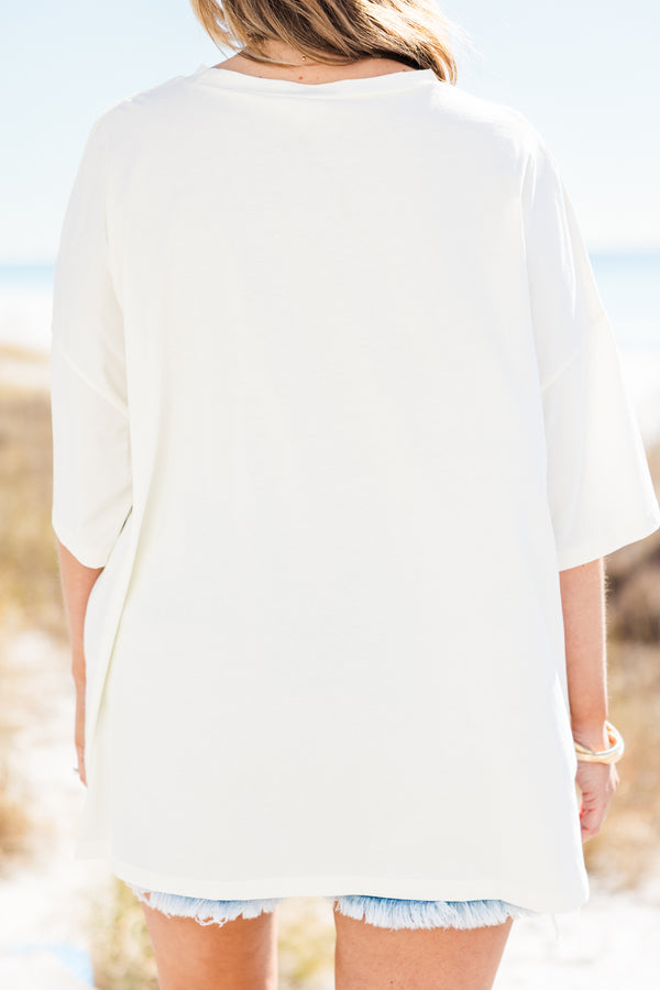 Chic Soul plus size clothing, short-sleeve ivory boyfriend tee with a high-scoop neckline and a light blue graphic art pattern of bows and seashells