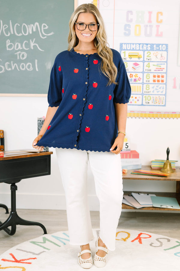 Plus size navy short sleeve cardigan with red embroidered apples, scallop trim, and a button-down front.