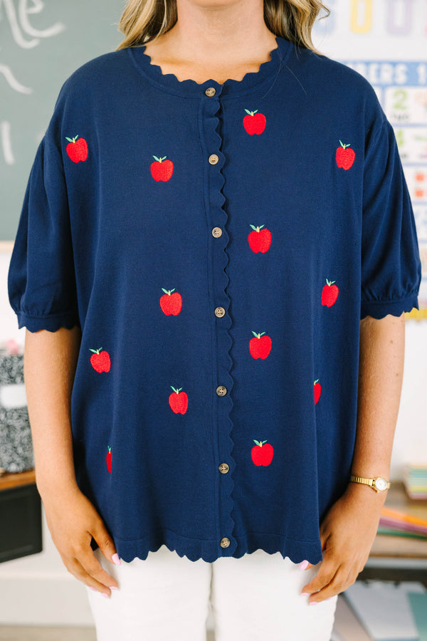Plus size navy short sleeve cardigan with red embroidered apples, scallop trim, and a button-down front.