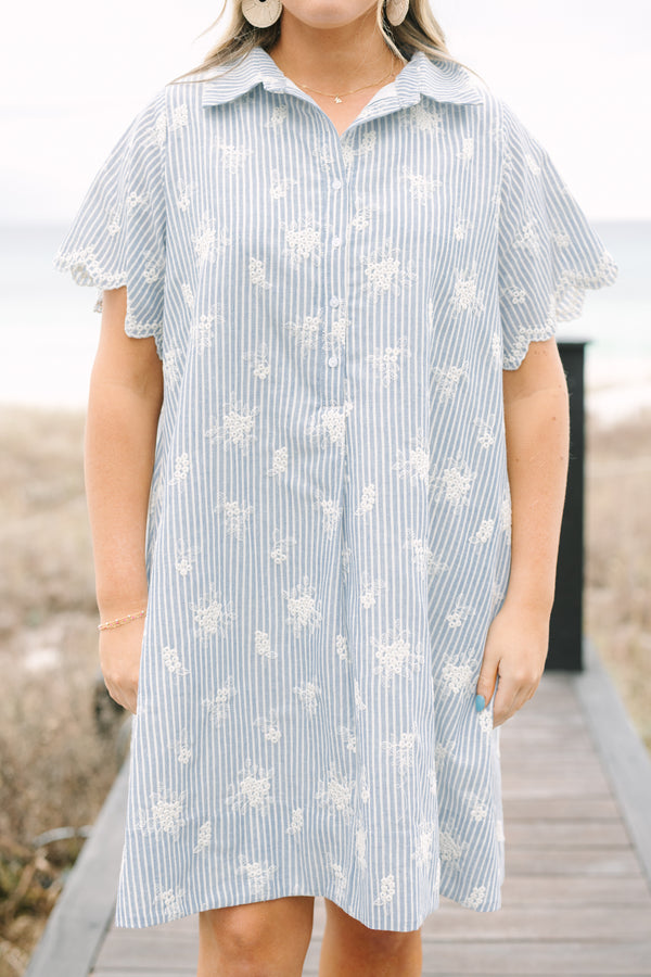 Chic Soul plus size clothing, blue striped knee length dress with short short sleeves buttons going down to the lower chest area as well as cream floral embroidery throughout the dress and along the bottom of each sleeve 

