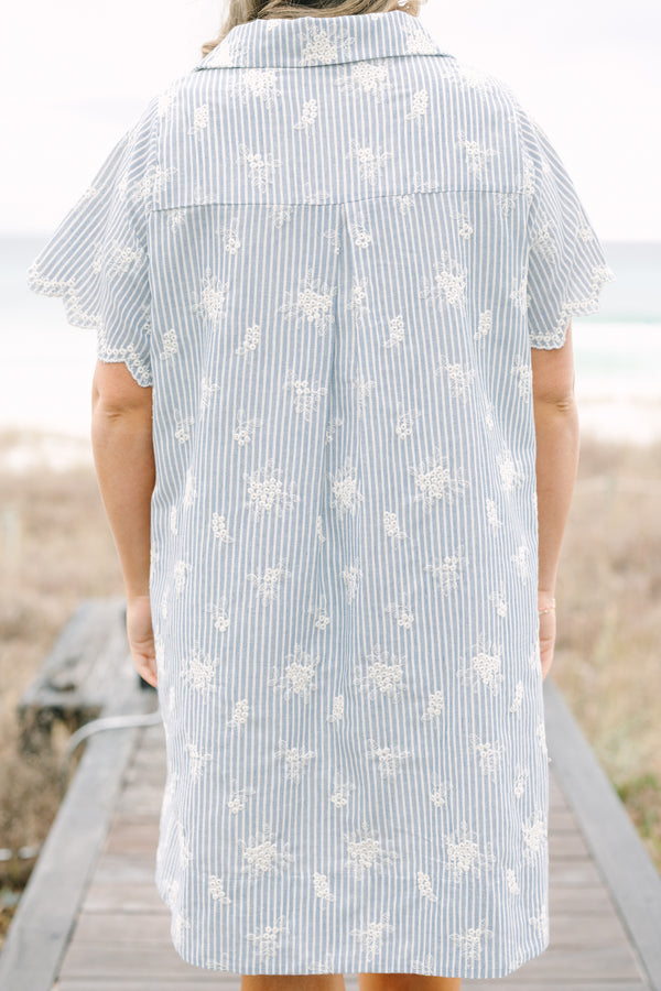 Chic Soul plus size clothing, blue striped knee length dress with short short sleeves buttons going down to the lower chest area as well as cream floral embroidery throughout the dress and along the bottom of each sleeve 
