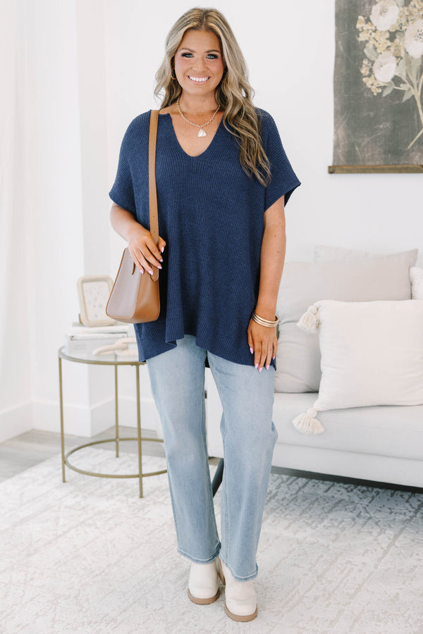 Plus size navy blue knit Sweet Escape Sweater with a flowy fit, V-neckline, and short sleeves.