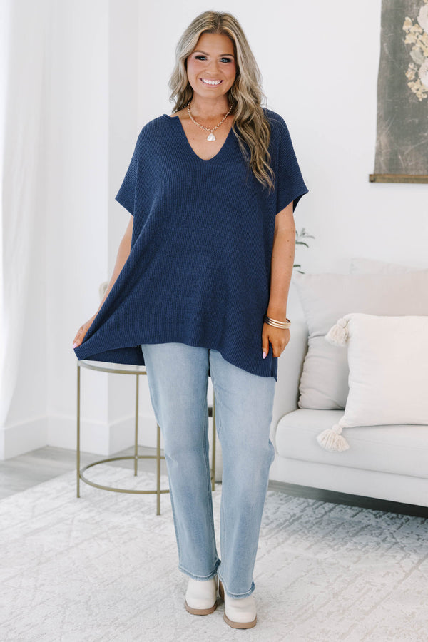 Plus size navy blue knit Sweet Escape Sweater with a flowy fit, V-neckline, and short sleeves.