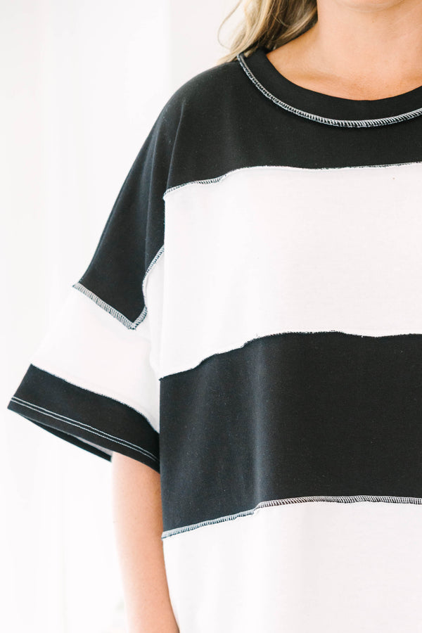 Plus size black and white striped tee with a flowy fit