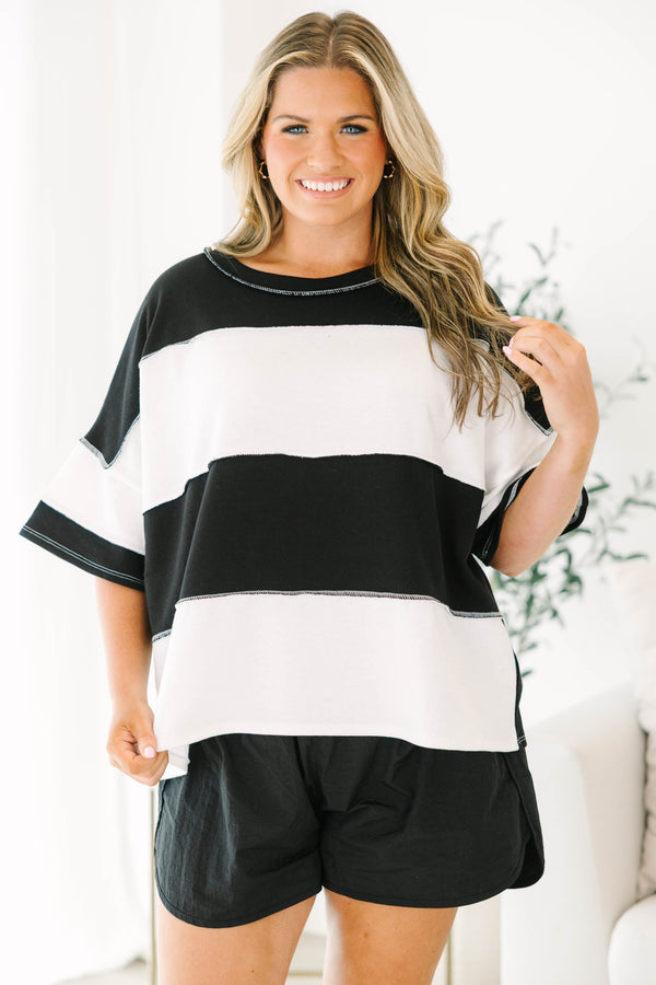 Plus size black and white striped tee with a flowy fit