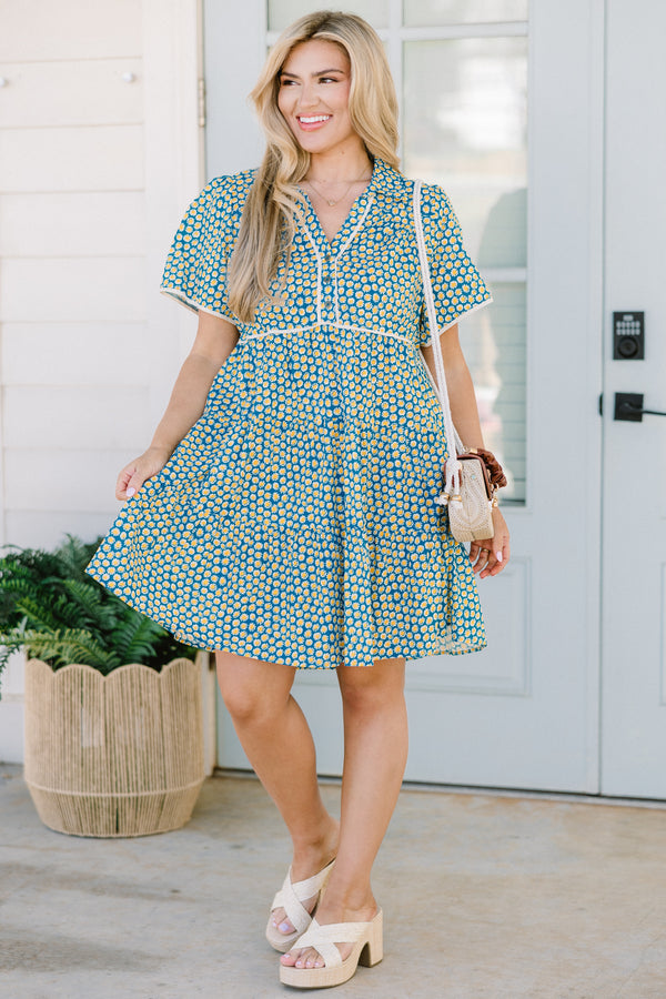 Chic Soul plus size clothing, short-sleeve collared teal mix baby doll dress with a white piping along the sleeves and bodice and a teal and yellow abstract spotted floral pattern 