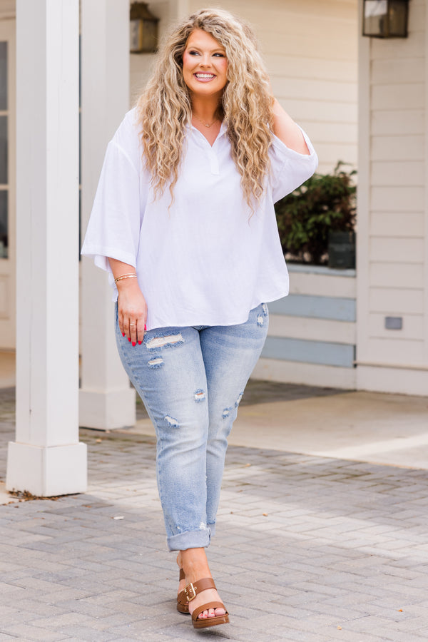 Plus Size off-white linen top with three-quarter sleeves and a notched v-neck collar.