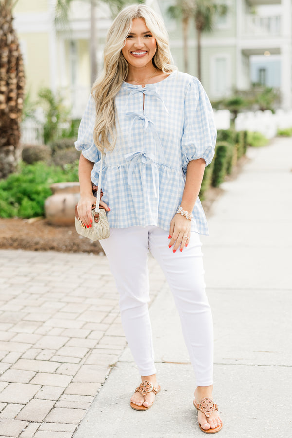 Chic Soul plus size clothing, short-puffed-sleeve blue and white gingham patterned baby doll top with a high-neckline and three bow ties tying the front of the top