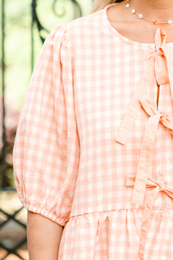 Chic Soul plus size clothing, pink gingham print short puff sleeve babydoll top with three bow ties along the front