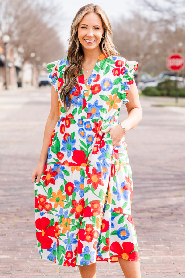 Plus Size white tiered midi dress with vibrant floral print, flutter sleeves, and V-neckline.