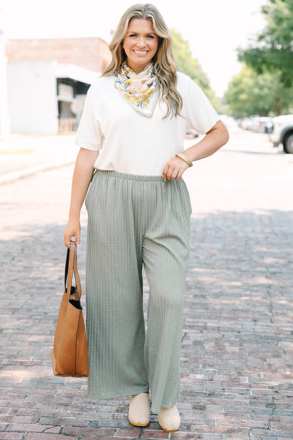 Plus Size sage green wide-leg pants with a cable knit texture and elastic waistband.