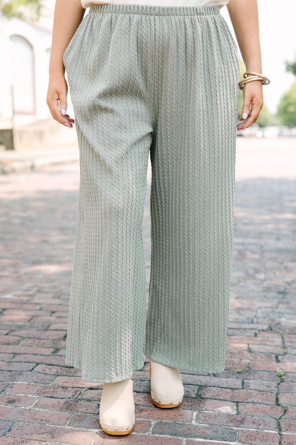 Plus Size sage green wide-leg pants with a cable knit texture and elastic waistband.