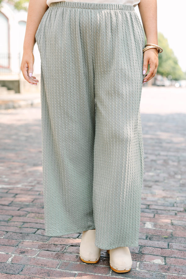 Plus Size sage green wide-leg pants with a cable knit texture and elastic waistband.