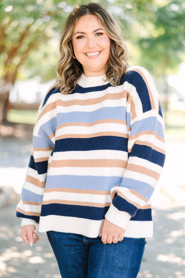 Plus Size oversized crewneck sweater with horizontal stripes in navy, light blue, tan, and white.