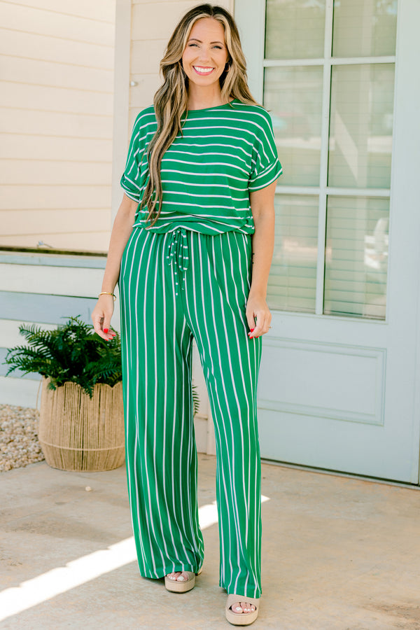 Chic Soul plus size clothing, green and ivory striped jumpsuit with short sleeves and a cuff detail at the end of each sleeve 