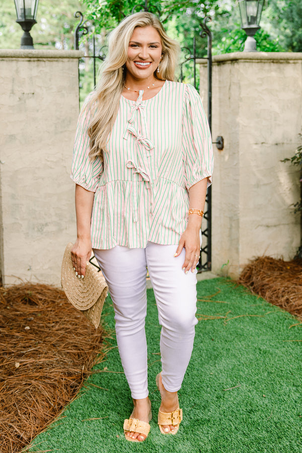 Chic Soul plus size clothing, pink short puff sleeve babydoll top with thin green vertical stripes and three bow ties along the front
