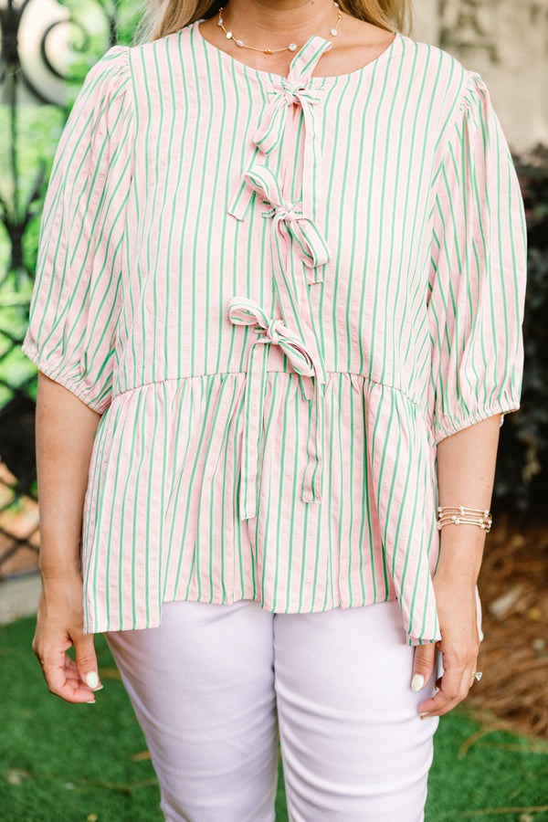 Chic Soul plus size clothing, pink short puff sleeve babydoll top with thin green vertical stripes and three bow ties along the front