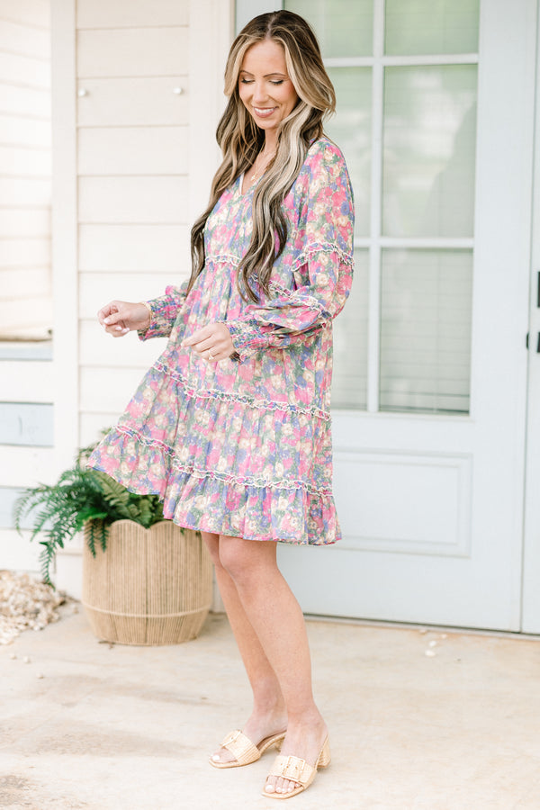 chic soul plus size clothing, purple short dress, with a multi-colored floral pattern, slight v-neck and long sleeves 