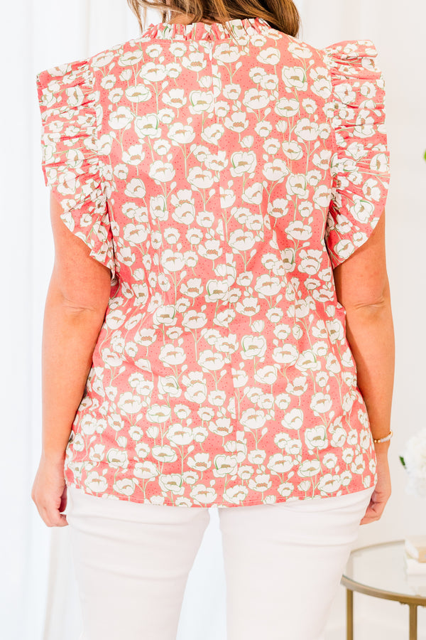 Plus Size peach floral print top with flutter sleeves and a high ruffled neckline.