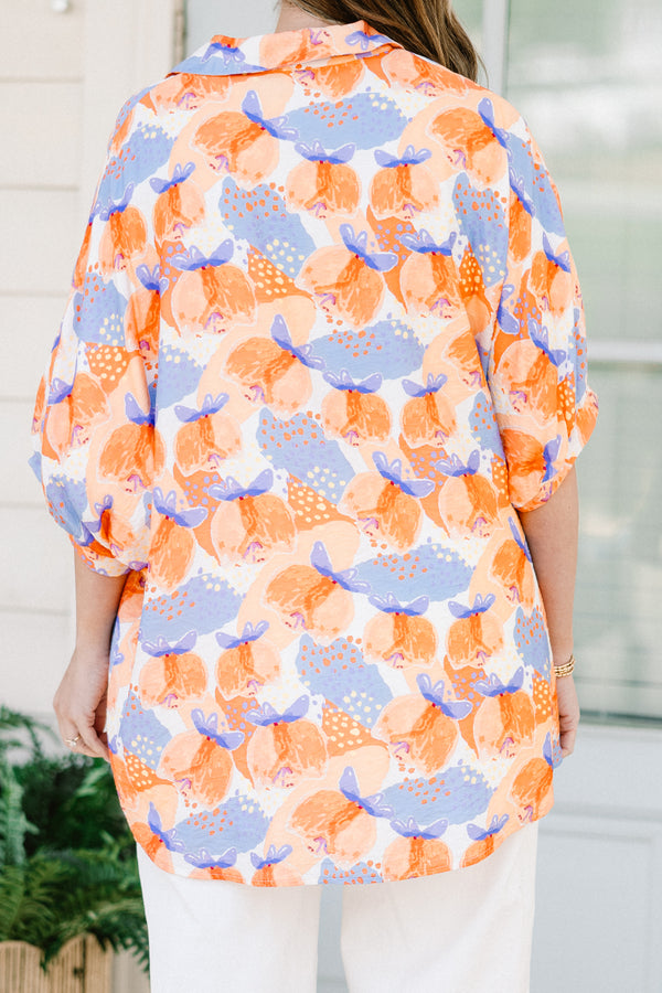 Chic soul plus size clothing, orange button-up top with a floral pattern and half sleeves 