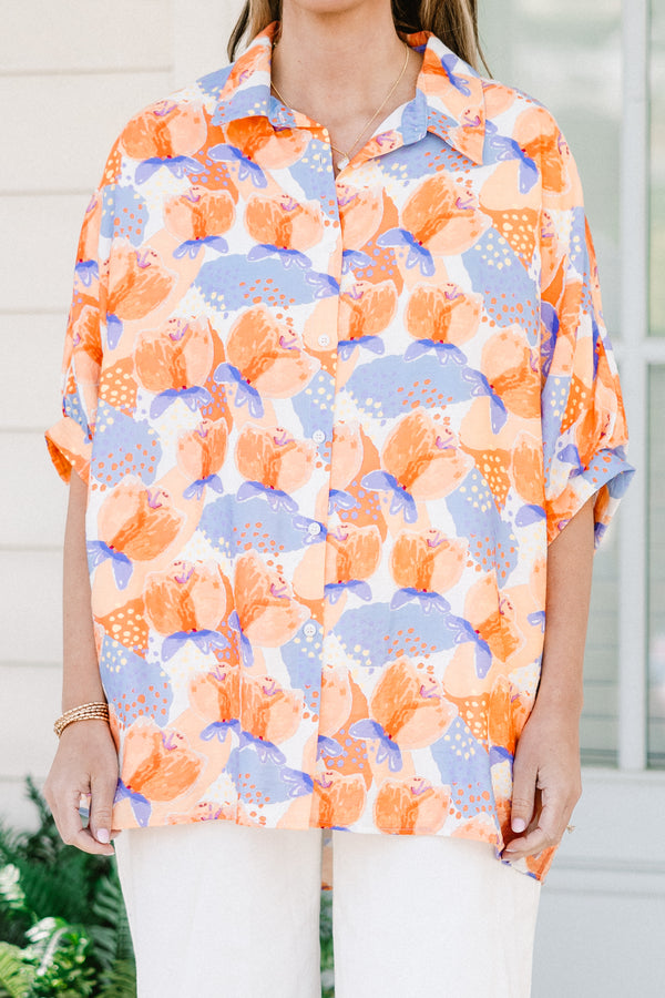 Chic soul plus size clothing, orange button-up top with a floral pattern and half sleeves 