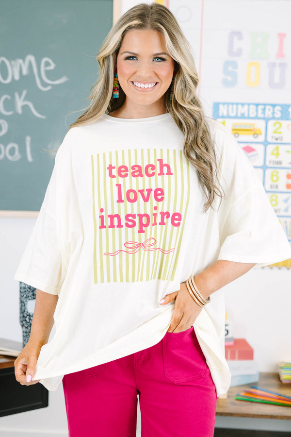 Plus Size ivory boyfriend tee with 'teach love inspire' graphic in hot pink with green stripe background