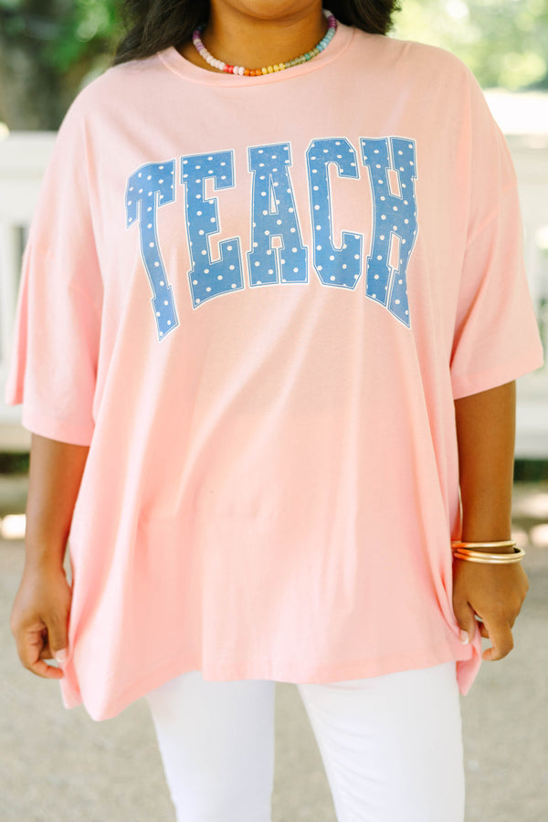 Plus size dark pink oversized boyfriend tee with blue polka dot 'TEACH' graphic