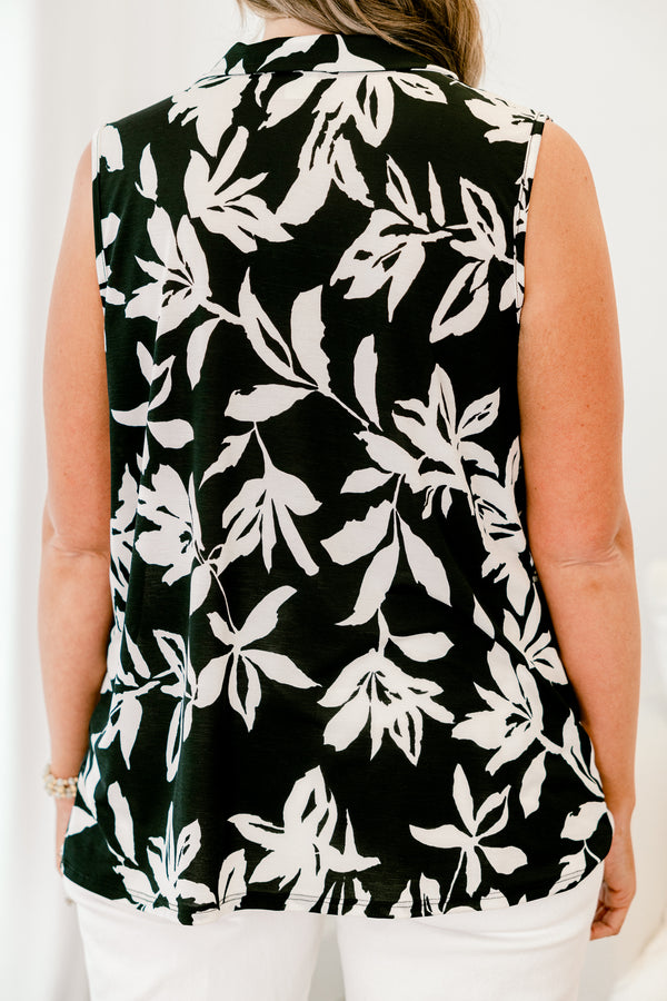 chic soul plus size clothing, black tank with a white floral pattern and a black lace strip down the center of the shir, it has a slight v-neckline 