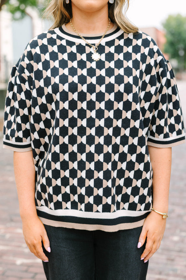 Plus Size black and tan geometric pattern short sleeve sweater with a crew neckline.
