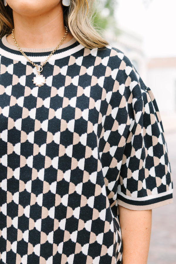 Plus Size black and tan geometric pattern short sleeve sweater with a crew neckline.