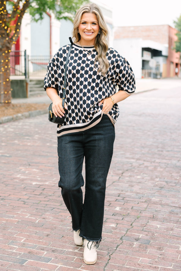 Plus Size black and tan geometric pattern short sleeve sweater with a crew neckline.