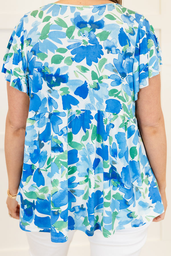 Chic Soul plus size clothing, blue short sleeve top with large floral print with v neckline with flutter sleeves