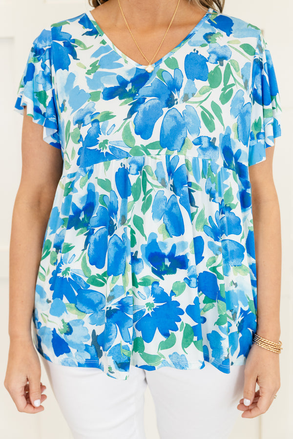 Chic Soul plus size clothing, blue short sleeve top with large floral print with v neckline with flutter sleeves