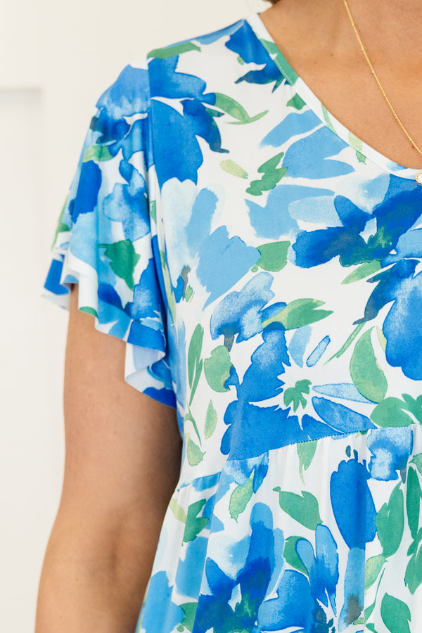 Chic Soul plus size clothing, blue short sleeve top with large floral print with v neckline with flutter sleeves