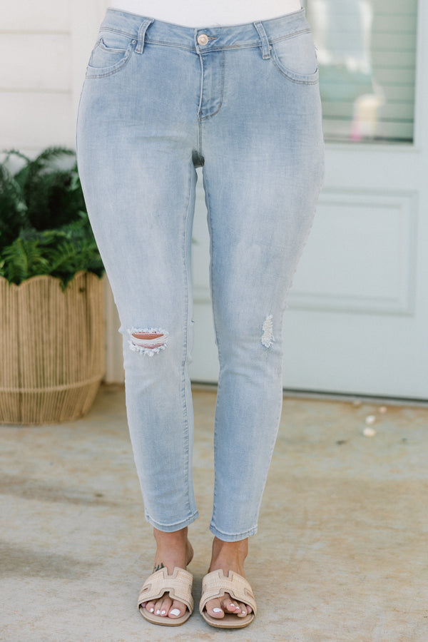 Chic Soul plus size clothing, light wash skinny jean with light distressing on the knees