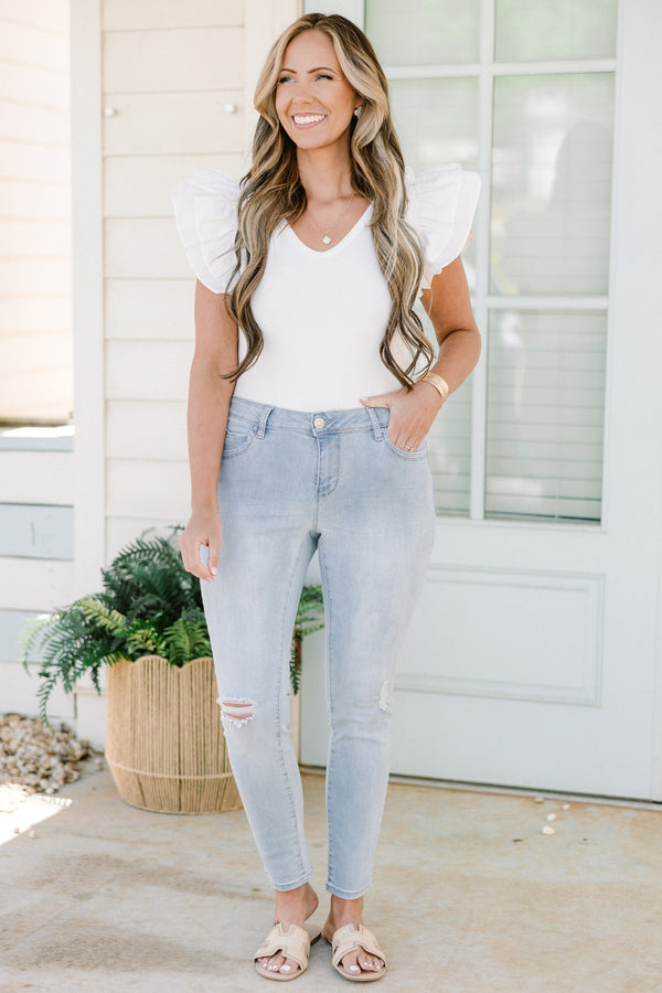 Chic Soul plus size clothing, light wash skinny jean with light distressing on the knees