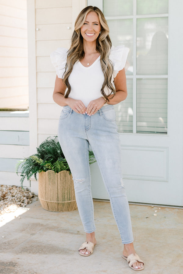 Chic Soul plus size clothing, light wash skinny jean with light distressing on the knees