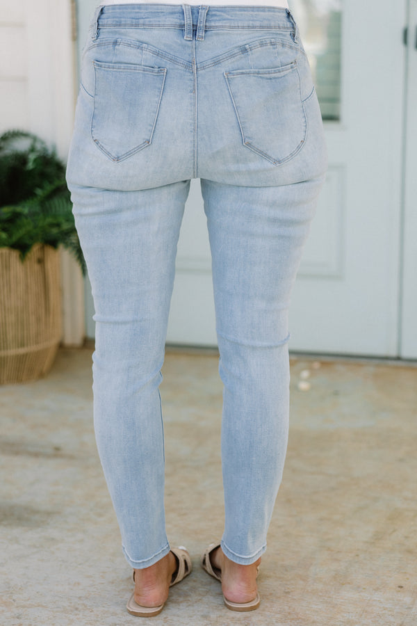 Chic Soul plus size clothing, light wash skinny jean with light distressing on the knees