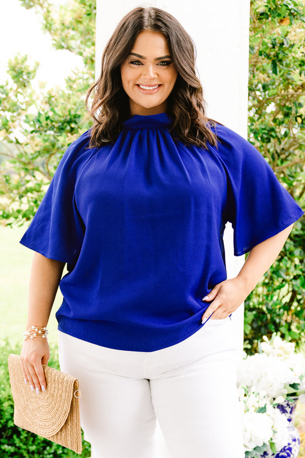 Chic Soul plus size clothing, royal blue blouse with a high neckline and flowy sleeves