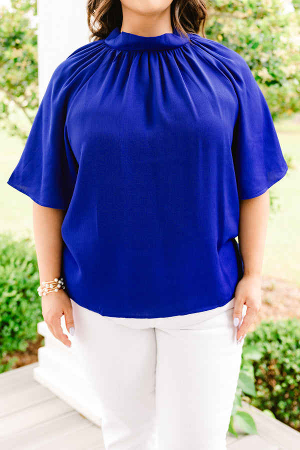 Chic Soul plus size clothing, royal blue blouse with a high neckline and flowy sleeves