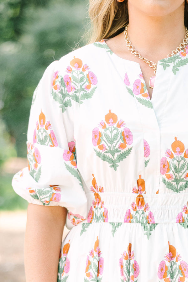 Plus Size white floral tiered maxi dress with short puff sleeves and a v-neckline.
