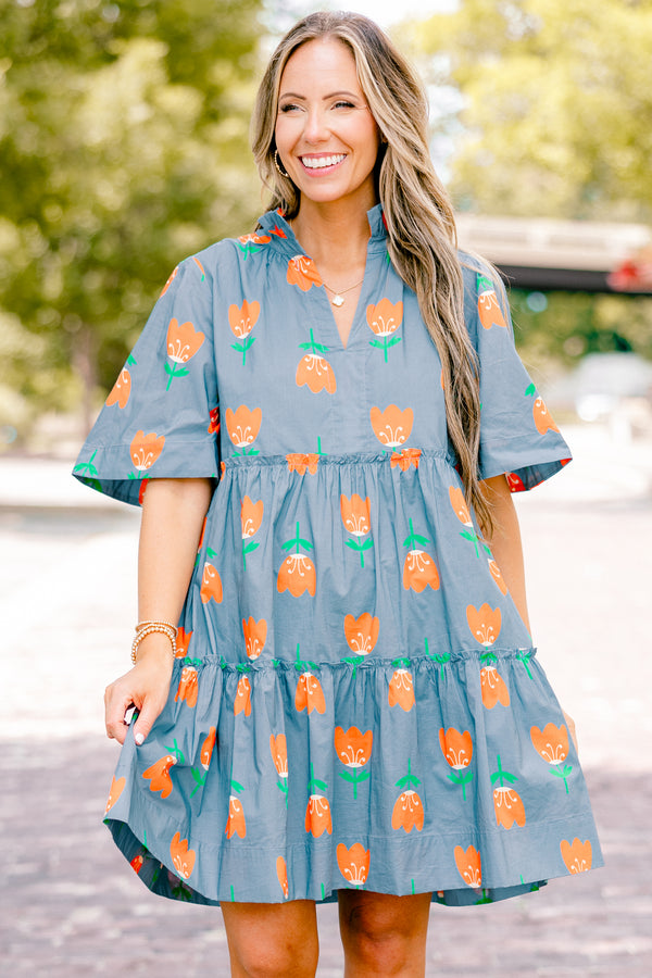 Chic Soul plus size clothing, orange baby doll dress with short sleeves and orange tulips throughout the dress