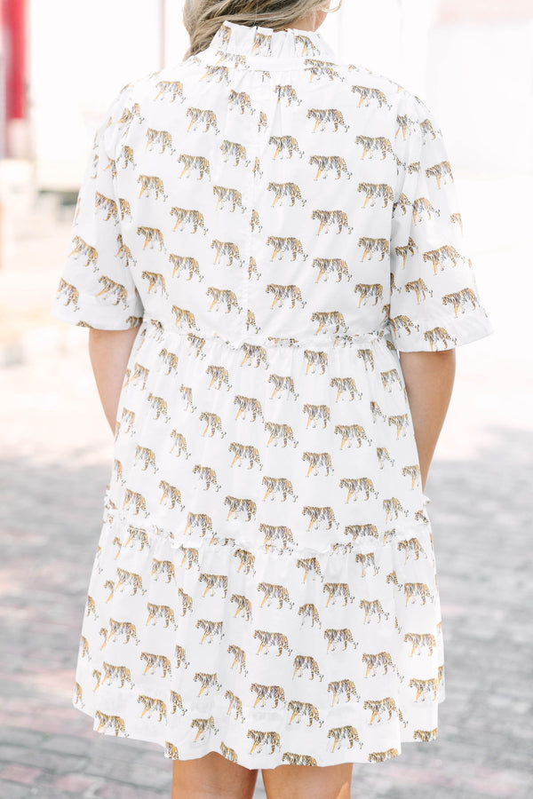 Chic Soul plus size clothing, white babydoll dress with a tiger pattern throughout and the dress has short sleeves and a slight v-neckline 