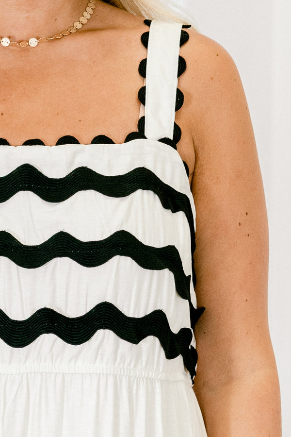 Plus Size cream maxi dress with black ric rac detailing, square neckline, and tiered skirt.