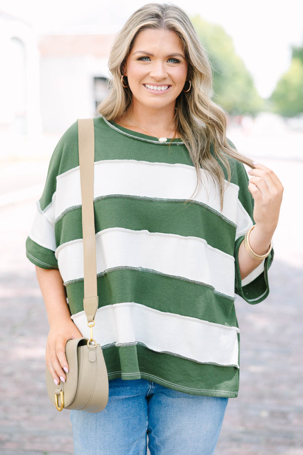 Plus Size army green and white striped French terry top with exposed seams and a relaxed fit.