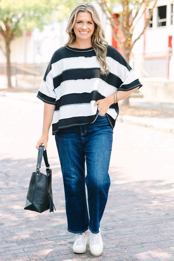 Plus Size black and white horizontal striped top with raw-edge seams and short sleeves.