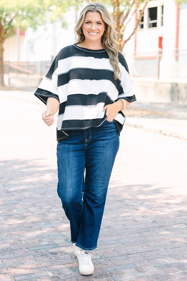 Plus Size black and white horizontal striped top with raw-edge seams and short sleeves.