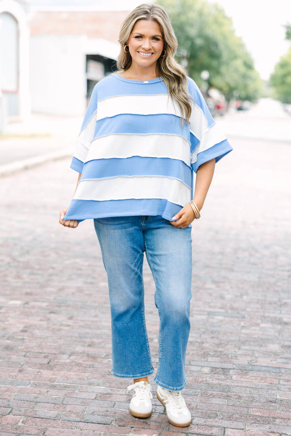 Plus Size cornflower blue and white striped French terry top with exposed seams and relaxed fit.