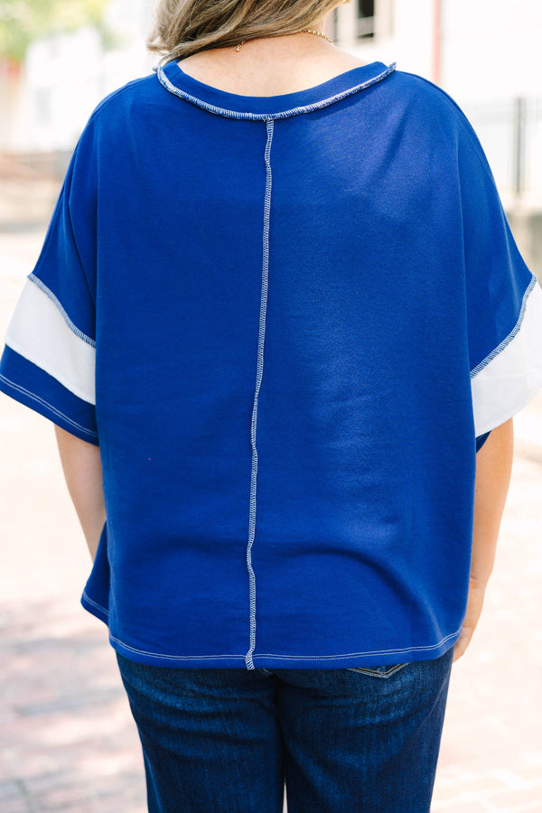 Plus Size navy and white striped French terry top with exposed seams and a relaxed fit.